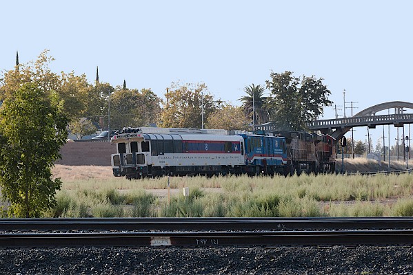 BNSF8289 (ES44C4) - UP5570 (C44ACCTE) - DOTX218 Gage Restraint Measurement Vehicle - DOTX220 Geometry Car